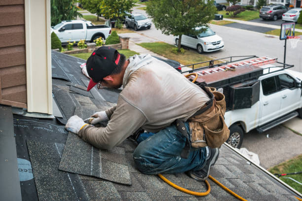 Professional Storm Damage Roof Repair technician working in Mulberry, FL